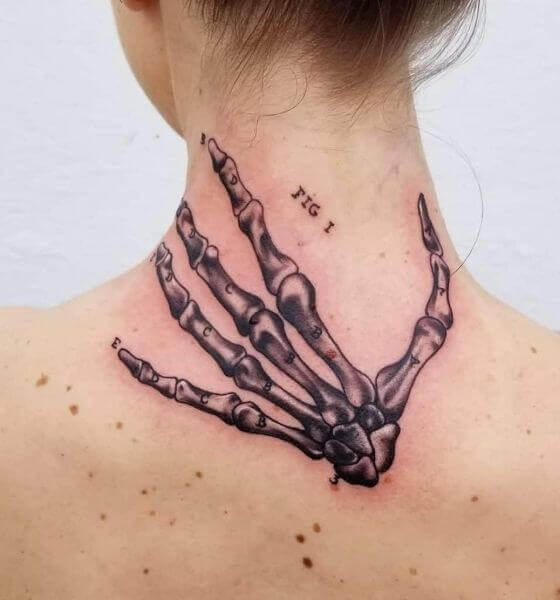 Back Skeleton Hand Tattoo