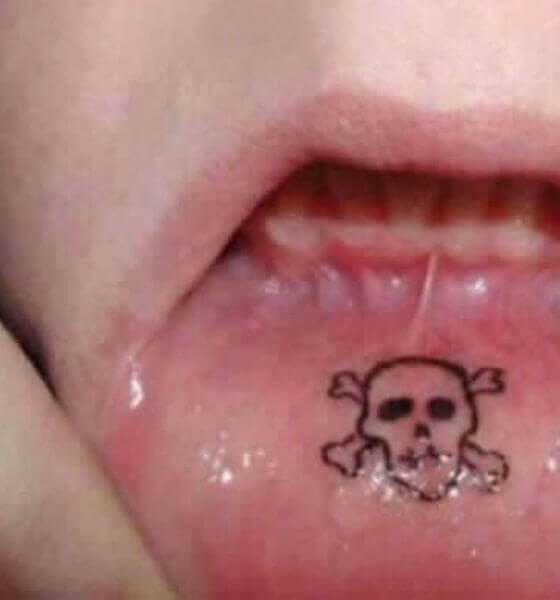 Neck tattoo on red lips Lip Tattoos