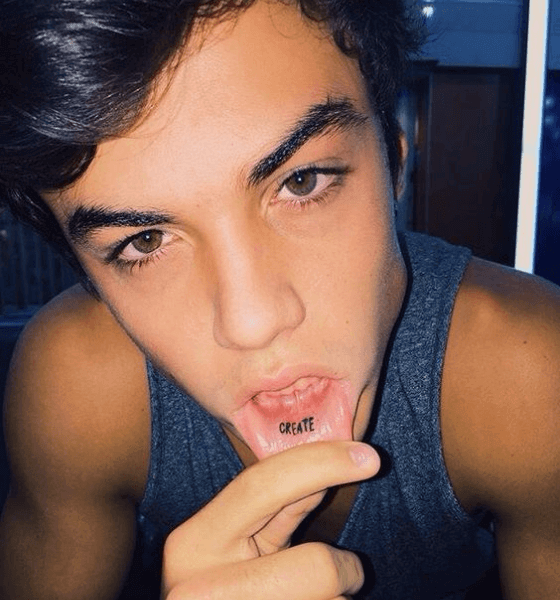 Ethan Dolan has Create tattooed on his inner lips