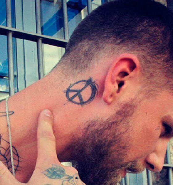 Small Peace Symbol tattoo ideas behind the aear
