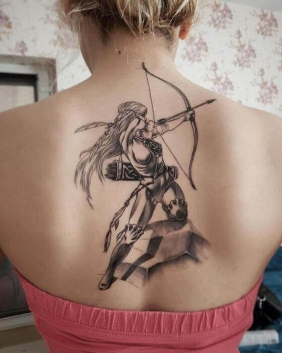 Sagittarius Arrow Tattoo on women Back