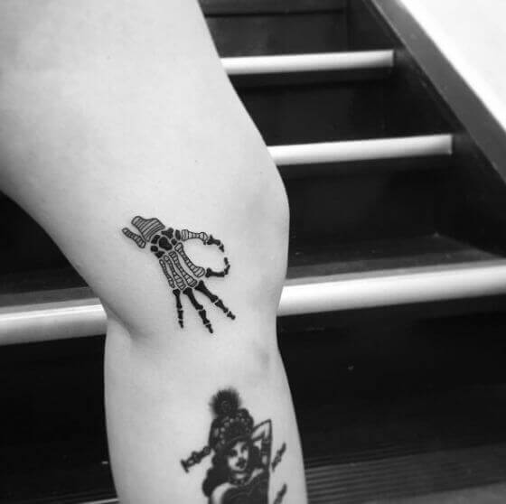 minimalist-skeleton-hand-tattoo-designs