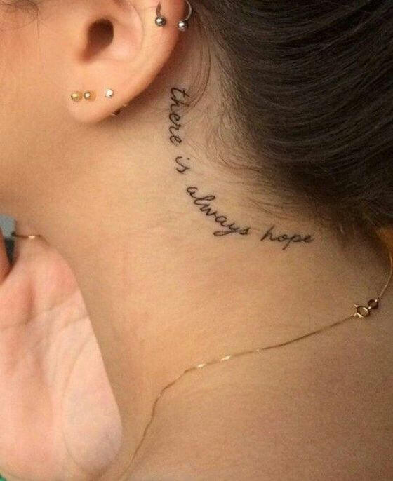 quote tattoo on behind ear