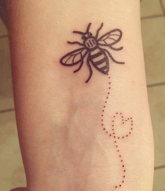 Honey bee tattoo on the arm 4