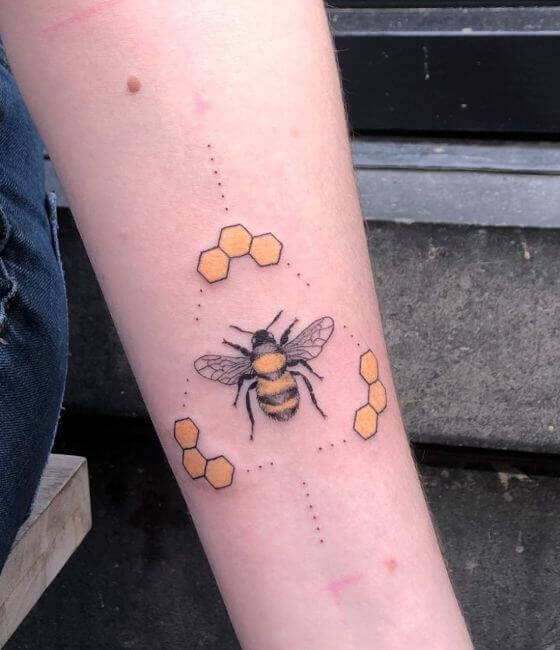 Honey bee tattoo on the forearm 3