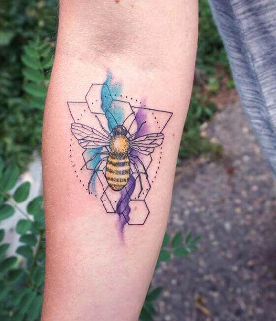 colorful Honey bee tattoo on the forearm