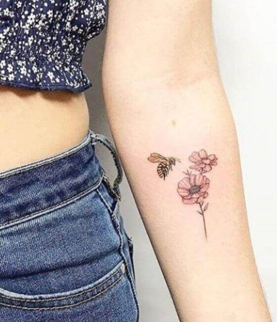 Honey bee tattoo on the women forearm