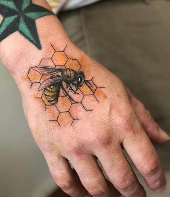 Honey bee tattoo on the hand
