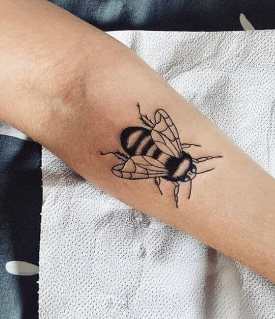 Honey bee tattoo on the leg 1
