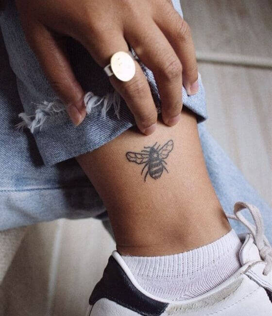 Honey bee tattoo on the leg 6