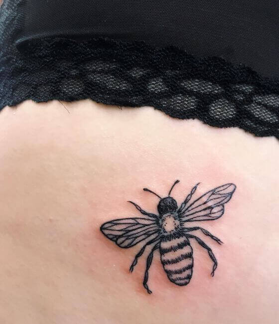 Honey bee tattoo on the waist
