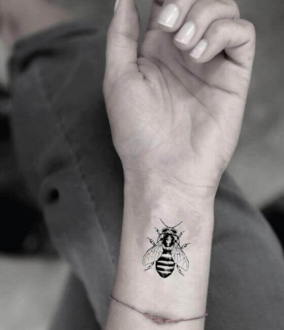 Honey bee tattoo on the wrist