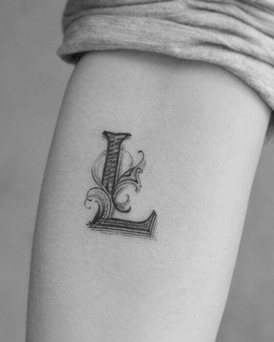 Top Initial Tattoo Designs on forearm 
