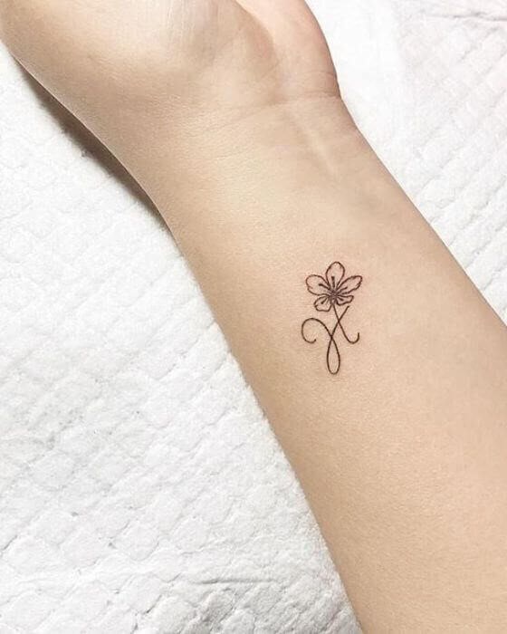Beautiful Initial Tattoo Designs on wrist 