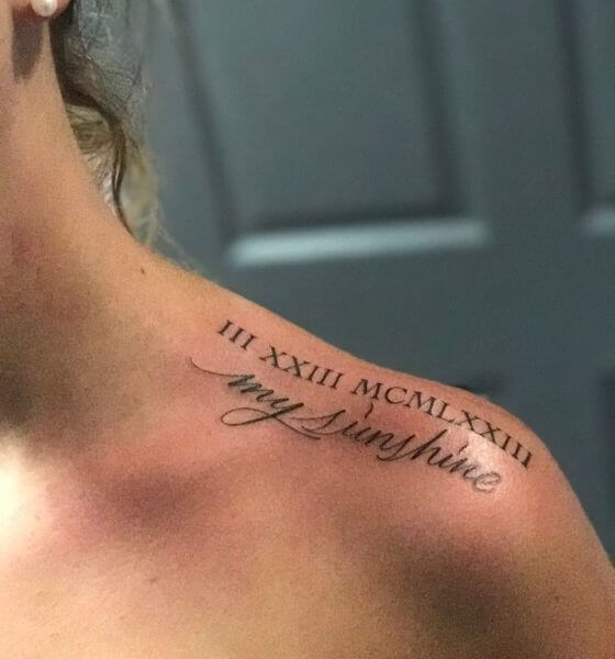 Roman Numeral Name Tattoo on The Shoulder 