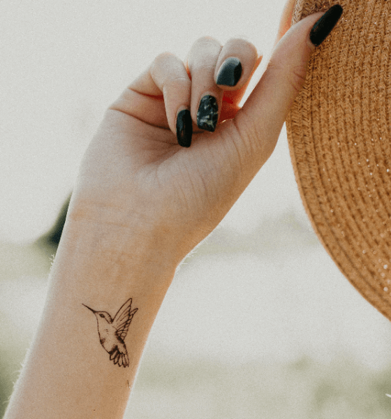 Small Hummingbird Tattoo on girl's wrist