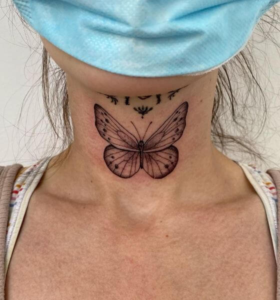 Beautiful Butterfly Tattoo on neck