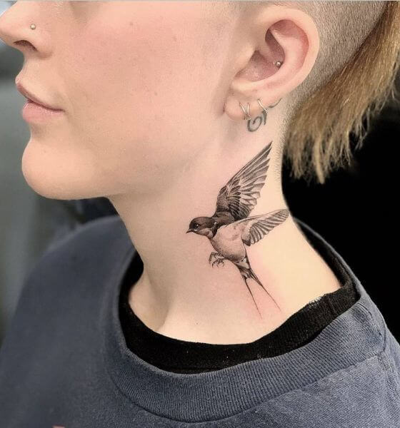 Beautiful bird neck tattoo
