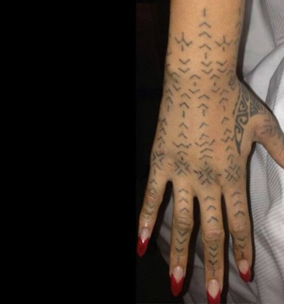 Chevron lines on the back of her hand
