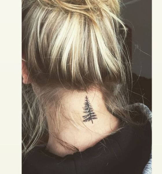 Christmas tree tattoo on neck