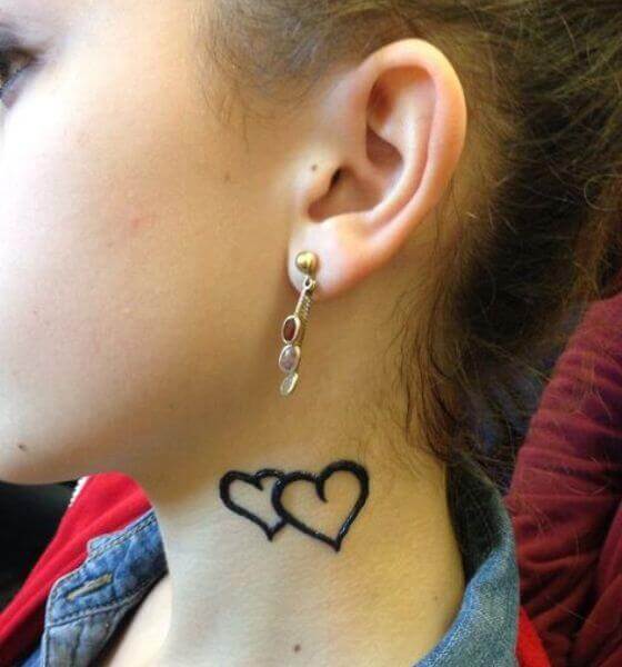 Heart neck tattoo
