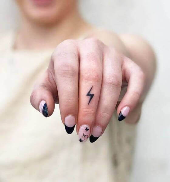 Lightning Bolt Finger Tattoo