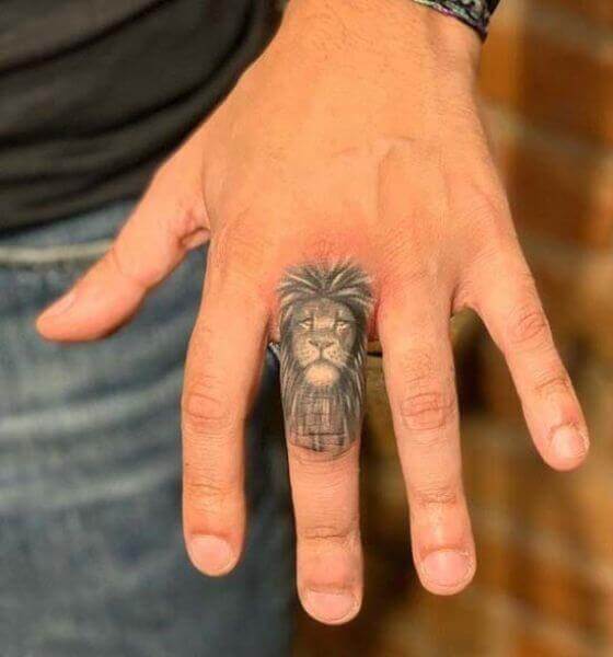 Lion Finger Tattoo