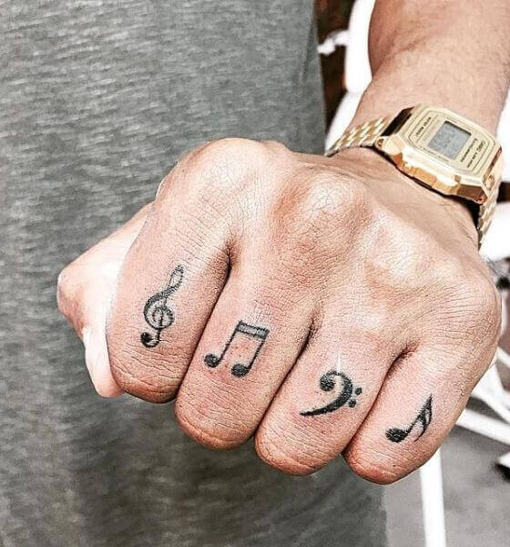Music Symbol Finger Tattoo