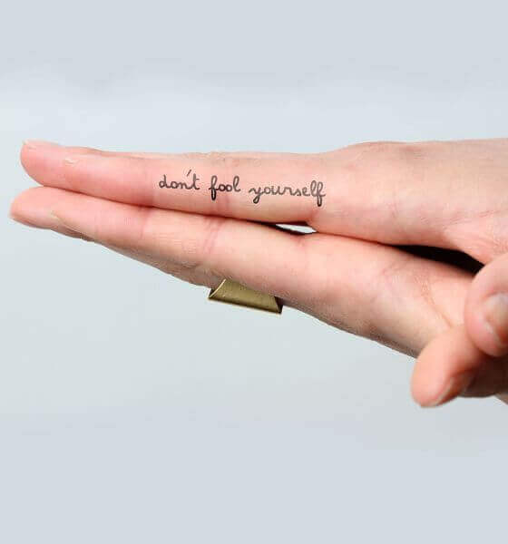 Phrase Finger Tattoo