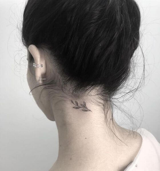 Small leaf Tattoo on neck for women