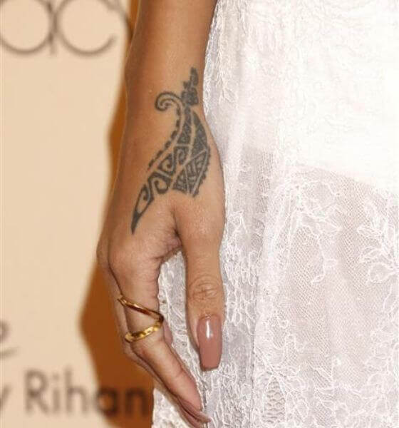 Tribal dragon claws on her hand | Rihanna's tattoo