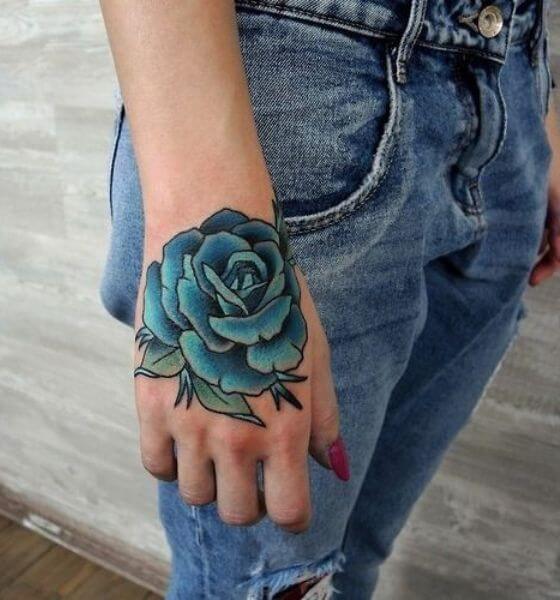 Amazing Blue rose tattoo on hand