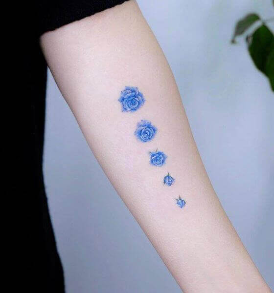 Amazing round-round blue rose tattoo design