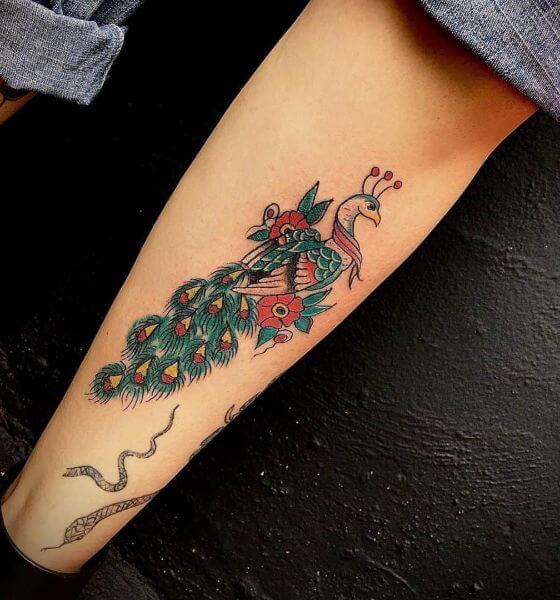 Beautiful Peacock Tattoo on Sleeve