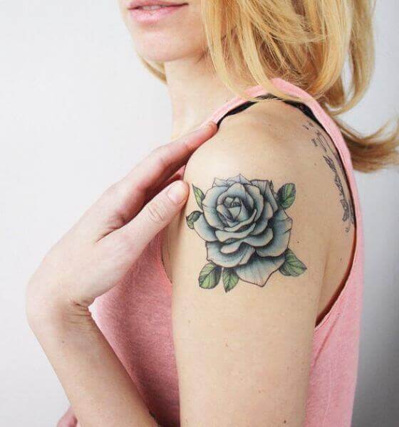 Blue rose tattoo on half sleeve