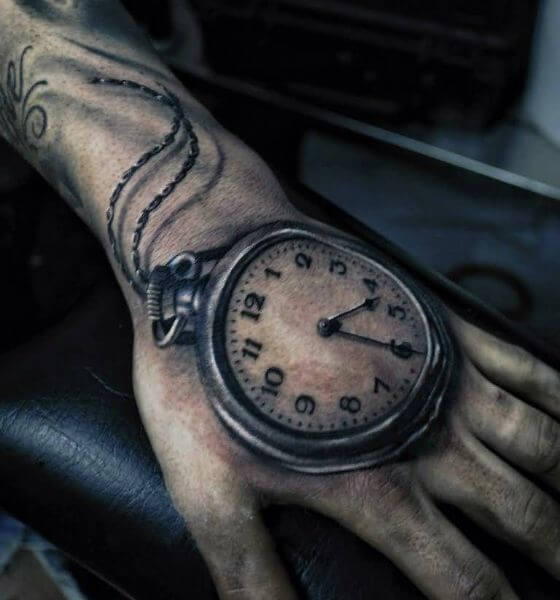 BRIGID BURKE  Fading clock and compass tattoo from last