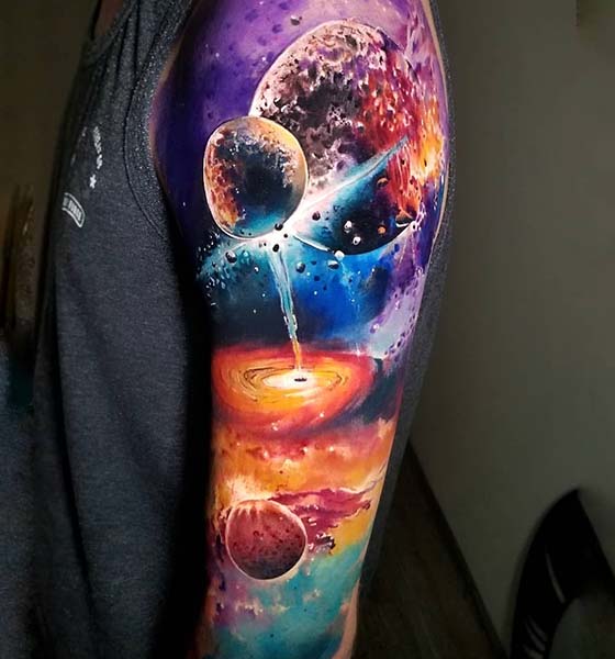 Eye-sketching Space tattoo on sleeve