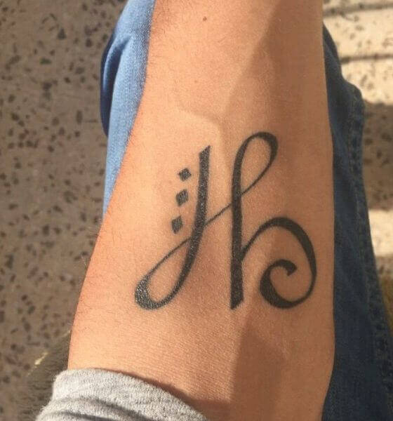 Faith Symbol Tattoo on Hand