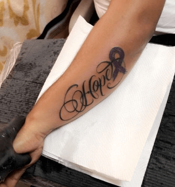 Hope tattoo on sleeve