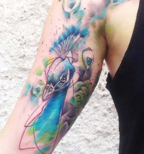 Pretty Peacock Face Tattoo