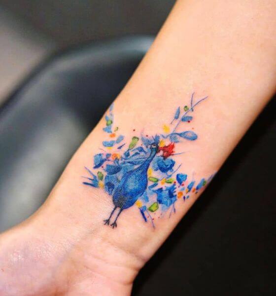 Stunning Peacock Tattoo on Wrist