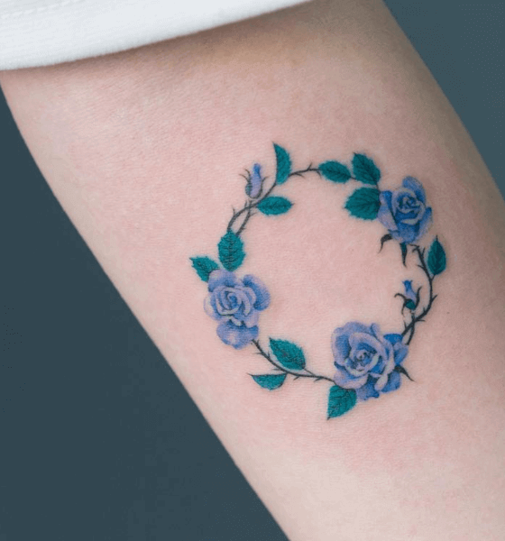 Roundy blue rose tattoo design