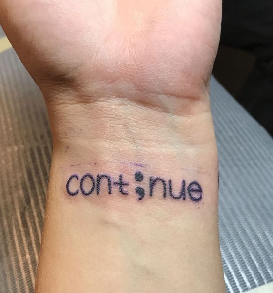 Semicolon Word Tattoo on Wrist