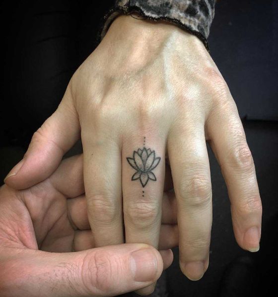 Tiny Lotus Flower on Finger