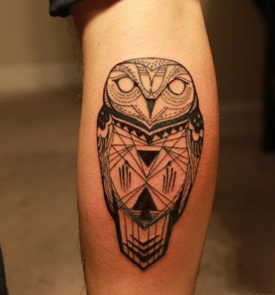 Delightful owl tattoo on leg