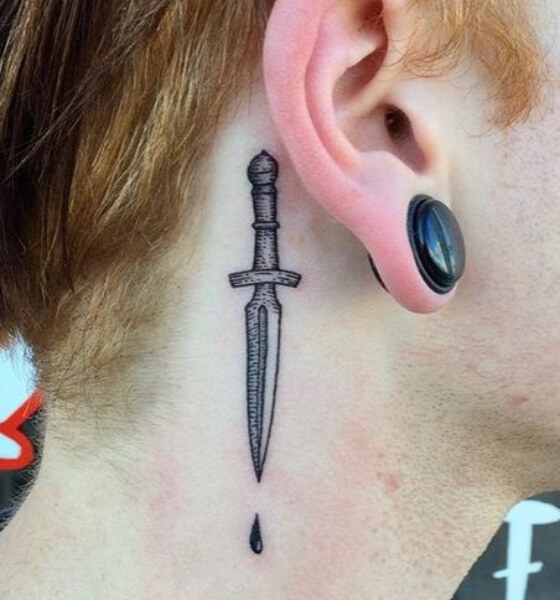 Behind the ear sword tattoo design