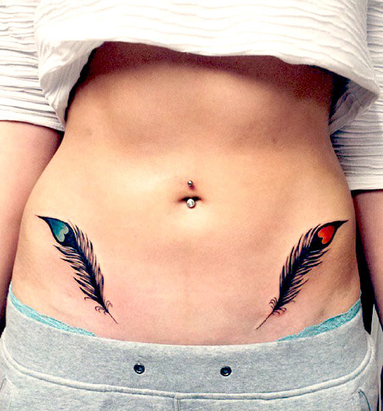 Feather Stomach Tattoo Ideas for Girls