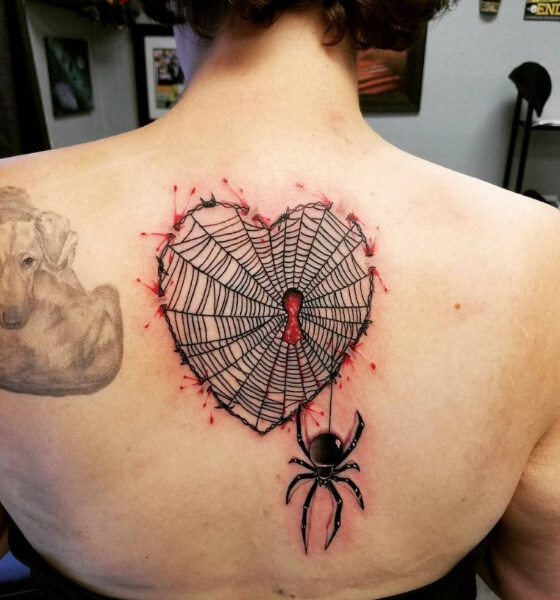 Heart spider tattoo on back