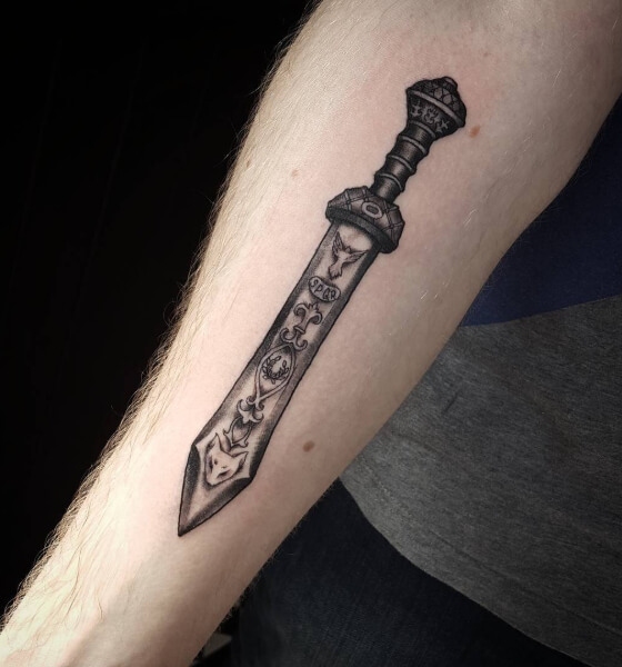 Mind-Blowing Sword Tattoo Design on Arm