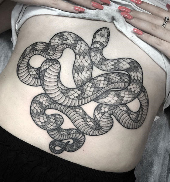 Snake tattoo on stomach